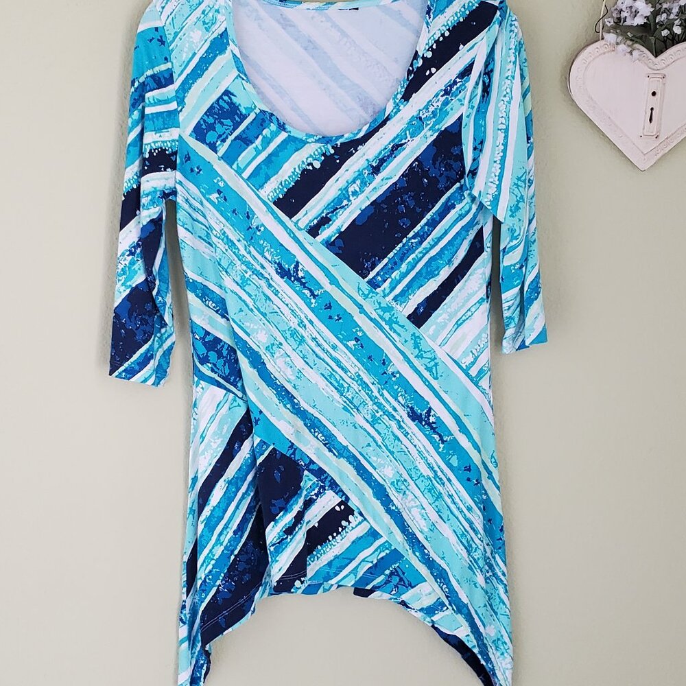Women's long tunic with whale tail sides.